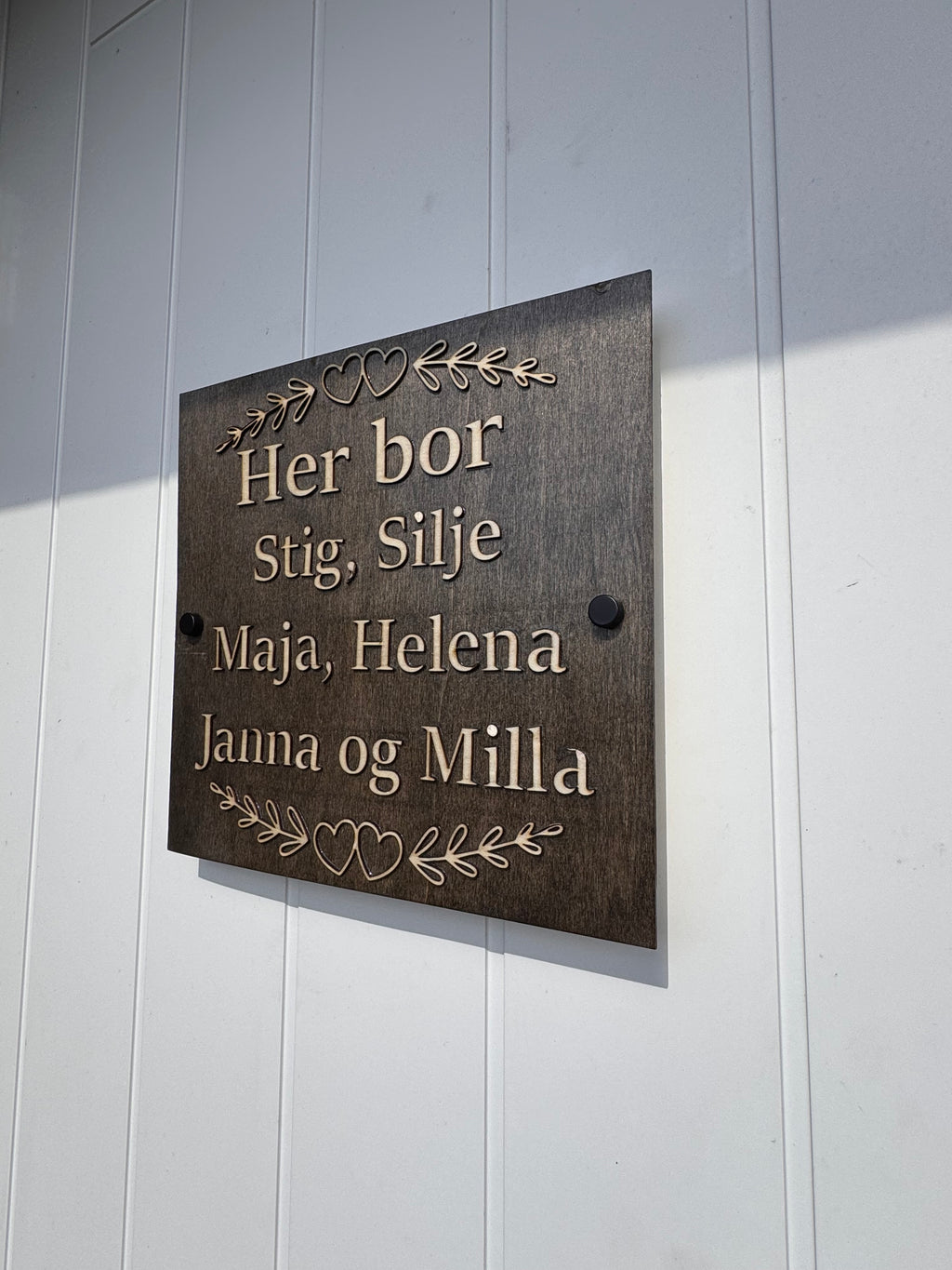 Firkantet Her bor skilt